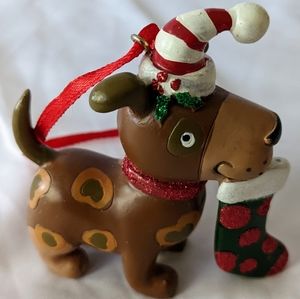 Brown Christmas Dog Ornament Wearing Santa Hat & Hiding Stocking